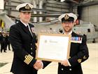 WO 1 (ACMN) Jay O’Donnell receives his Warrant Officer Parchment from Capt Adrian Orchard OBE