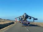 The Harrier is transported by road to Stanley